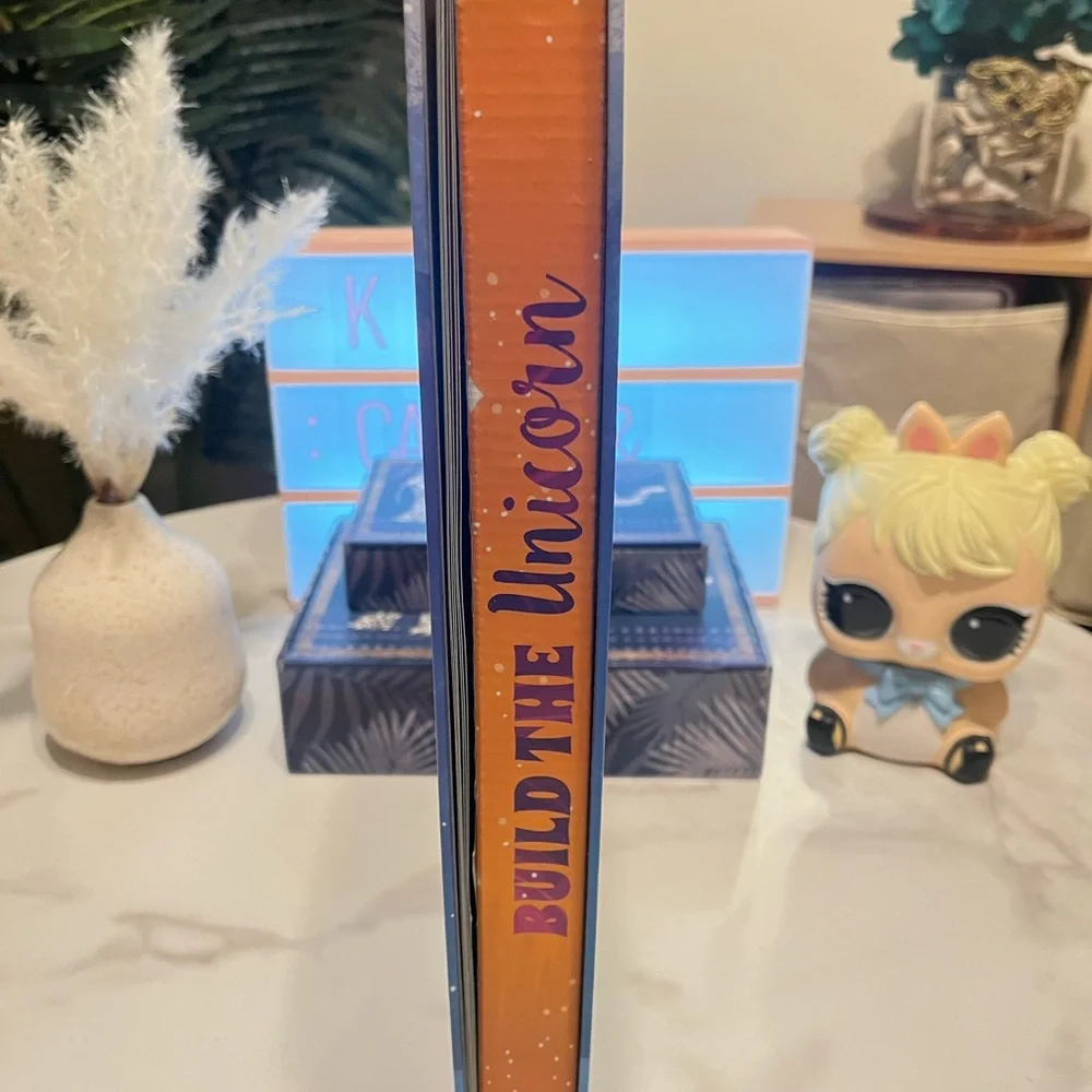 Build the Unicorn Kids Building Set, reading book, and Lear